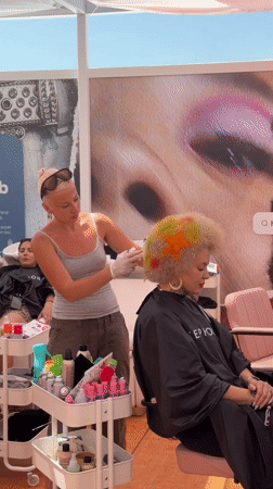 Beauty brand activation and street style in midday Cannes