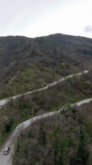 Mountain vista with Bulgarian flag filmed near Asenovgrad