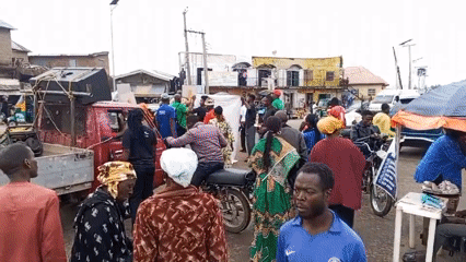 Daily life unfolds across Jos and Gwong streets
