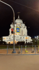 Illuminated Orthodox cathedral filmed at night in Saint Petersburg