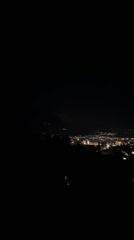 Nighttime cityscape captured from elevated view in Šušanj, Montenegro
