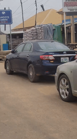Commercial vehicles observed near cement marketplace in Keffi, Nigeria