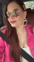 Woman in distinctive accessories observed in car, Riga