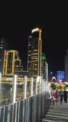 Night out at Orbi City: skyline lights, fountains, and street life