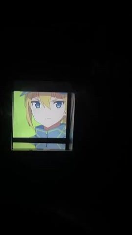 This media file consists of a series of short video clips, each displaying a still image on a small, illuminated screen within a dark environment. The screen appears to be a display within a larger object, possibly a device or a piece of equipment. The overall setting is dark, with the illuminated screen being the primary source of light in each clip.

The first clip shows an anime-style illustration of a young person with blonde hair and blue eyes, wearing a blue jacket and a cap. They are looking directly at the viewer with a serious expression.

The second clip transitions to a different anime-style image, showing the upper body of a person from behind, with blonde hair.

The third and fourth clips reveal a blank, bright white screen, possibly a transition or loading screen.

The fifth clip displays a silhouette of what appears to be an open umbrella against a colored background, possibly suggesting a landscape or sky.

The word "MECH" is visible in large, stylized white lettering on the dark surface to the right of the screen in the third, fourth, and fifth clips. This suggests that the device displaying the images might be related to "mech" or mechanical systems.

There are no clear indications of time of day, weather, or specific emotions beyond the stern look in the first clip. The location context of Ардонь, Russia, is provided but not visually evident within the media itself. The activity appears to be the sequential display of different images on a screen, possibly part of a demonstration or a game.