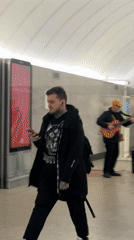 Moscow Metro Commuters Navigate Station During Evening Rush Hour