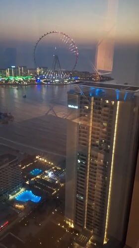 Dubai waterfront and Ain Dubai wheel captured at dusk