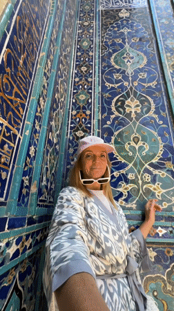 Tourists explore historic Samarkand necropolis on sunny morning