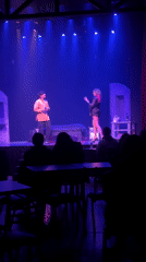 Theater stage scene with blue lighting in Buenos Aires
