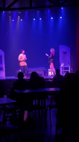 Theater stage scene with blue lighting in Buenos Aires