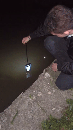 Person observed kneeling by water in Getsovo, Bulgaria