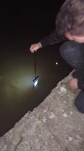 Person observed kneeling by water in Getsovo, Bulgaria