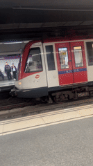 Subway train arrives at Sagrada Familia station in Barcelona