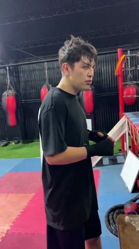 Hand wrapping and drills at a boxing gym in Arica