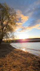 Sunset documented along Chaikovsky waterfront with artistic compositions