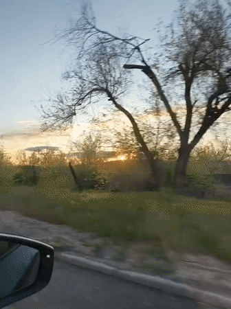 Driver captures sunset view while traveling through Kryvyi Rih