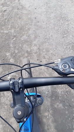 Cyclist rides mountain bike through Yurgamysh, Russia