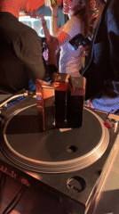 Gold object placed on DJ turntable in Paris