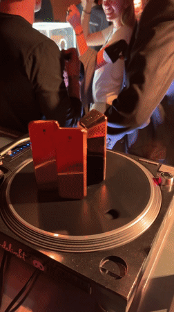 Gold object placed on DJ turntable in Paris