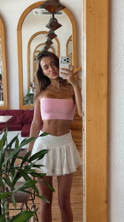 Mirror selfie at a Bodrum café, mid-pose
