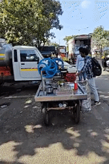 Mumbai street vendors and shops conduct normal business operations