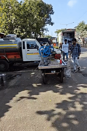 Mumbai street vendors and shops conduct normal business operations