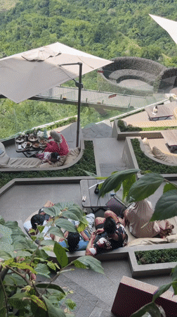Morning diners enjoy unique hillside restaurant in Indonesian mountains