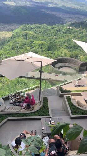 Morning diners enjoy unique hillside restaurant in Indonesian mountains
