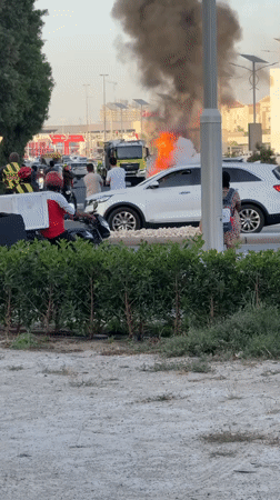 SUV catches fire on Dubai street, firefighters respond