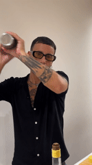 Bartender mixes cocktails at late-night venue in Búzios, Brazil