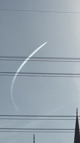 Morning moments in Esenyurt: contrails, mosque views, child eating