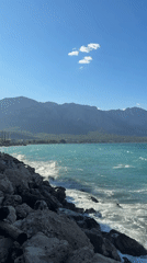 Selfie and seascape on Kemer's rocky turquoise coastline