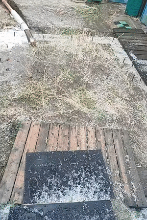 Hailstorm rolls through Kremenchuk, blanketing yards and gardens