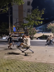 Outdoor gym and beach volleyball buzzing on a summer night
