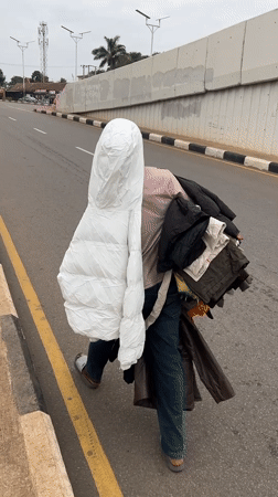 Street-level morning in Jos: commerce, commutes, and city life