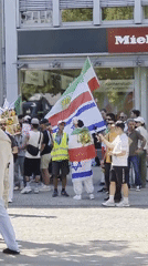 Iranian flag-waving protest draws police presence in Berlin