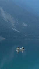 Early morning on Lake Molveno — fishing, running, Dolomite views
