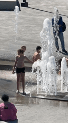 Lazy summer morning at Dmitrov's public fountain and park