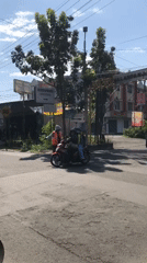 Everyday street activity in Buduran on a June morning