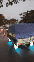 Dusk traffic backs up at a Teras intersection