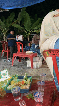 Nighttime wedding celebration with live music in Pulokulon, Indonesia