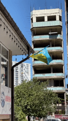 Morning life captured across Batumi: flags, plants, construction, peace signs