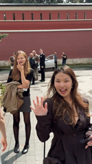 Casual social moment on a Moscow walkway, summer afternoon