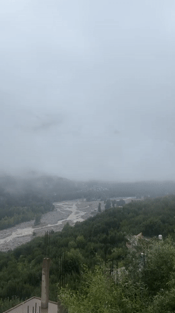Misty morning over Vashisht's river valley and forested hills