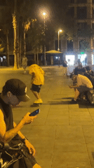 Late night skateboarding session interrupted by emergency response in Barcelona