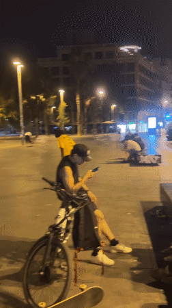 Late night skateboarding session interrupted by emergency response in Barcelona
