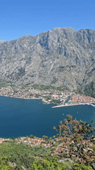 Scenic bay with boats filmed from above in Montenegro
