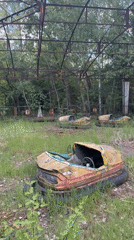 Witness documents decay at Pripyat's abandoned amusement park, pool