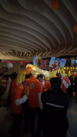 Orange-shirted group celebrates together in San Pedro Garza García