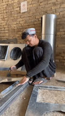 Metal workers fabricate components in Kandahar workshops